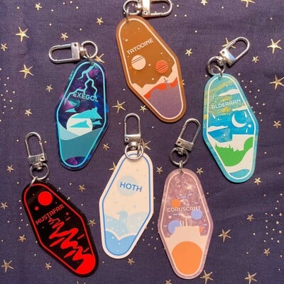 Space travel hotel keychains