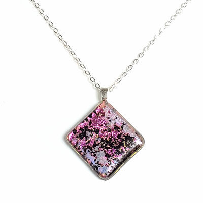 Dichroic pink splatter on black fused glass necklace