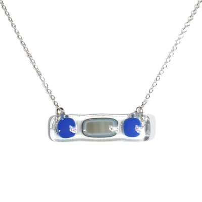 Blue and smoky grey dots on clear fused glass bar necklace