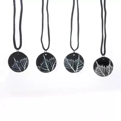 Round polymer clay leaf imprint pendant (black) 