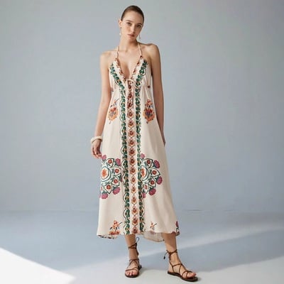 Fashionable resort style floral print suspender dress