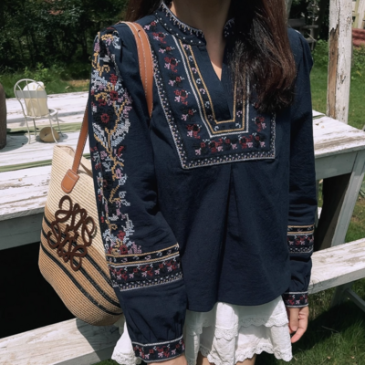 V-neck heavily embroidered shirt with printed embroidery and long sleeves