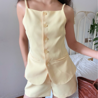 Sleeveless vest top with mini shorts