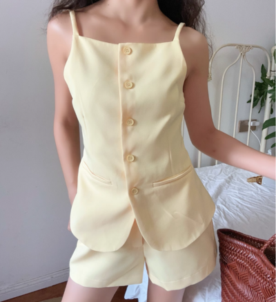 Sleeveless vest top with mini shorts