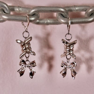 Barbed and bows earrings